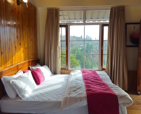 mountain-view-cottage-mukteshwar-06 Mountain view bedroom at Villa Oakland