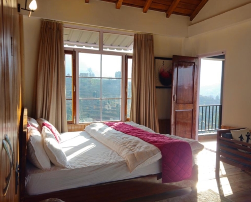 mountain-view-cottage-mukteshwar-09 Mountain cottage room with large windows
